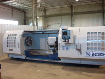 MODERN  TOOL  Hollow  Spindle-Heavy  Duty  CNC  Lathe, ModelTNC-1060x3000, 9  inch  Spindle  Bore, 42  inch  Swing  x  120  inc  centers